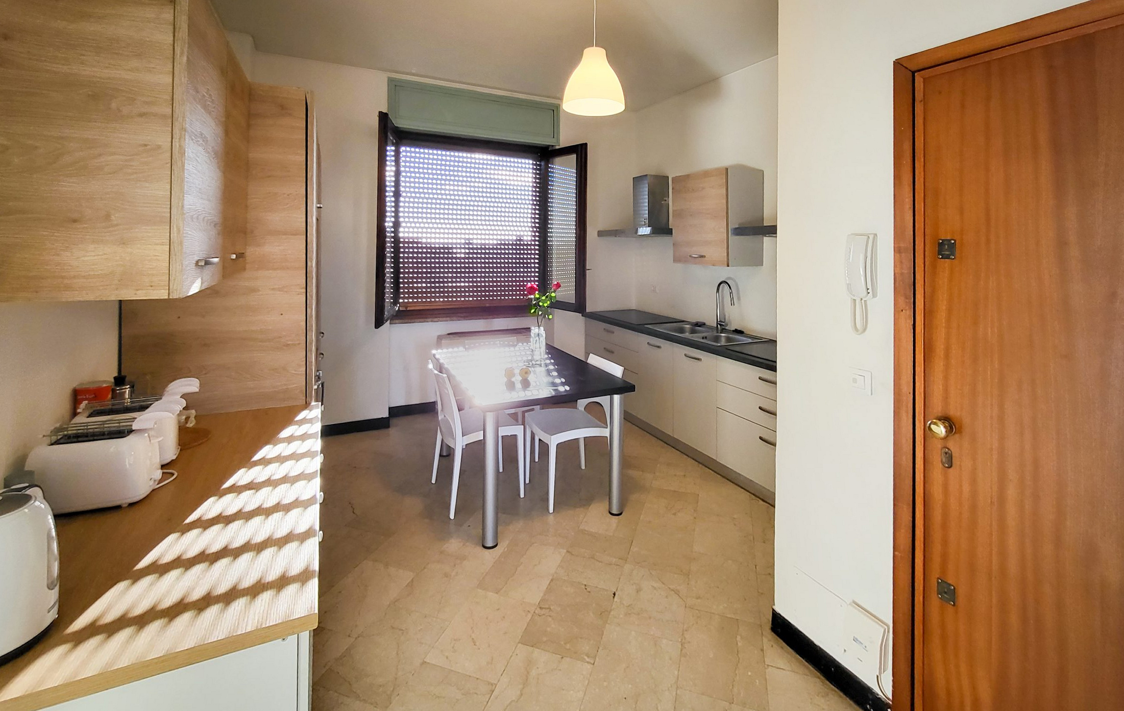 Kitchen and dining area — Viale della Stazione 23, fourth floor — corrected perspective Viale della Stazione 23 · Fourth floor